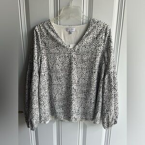 Small Koko + Mason - black and white print with bell sleeves above elbow.